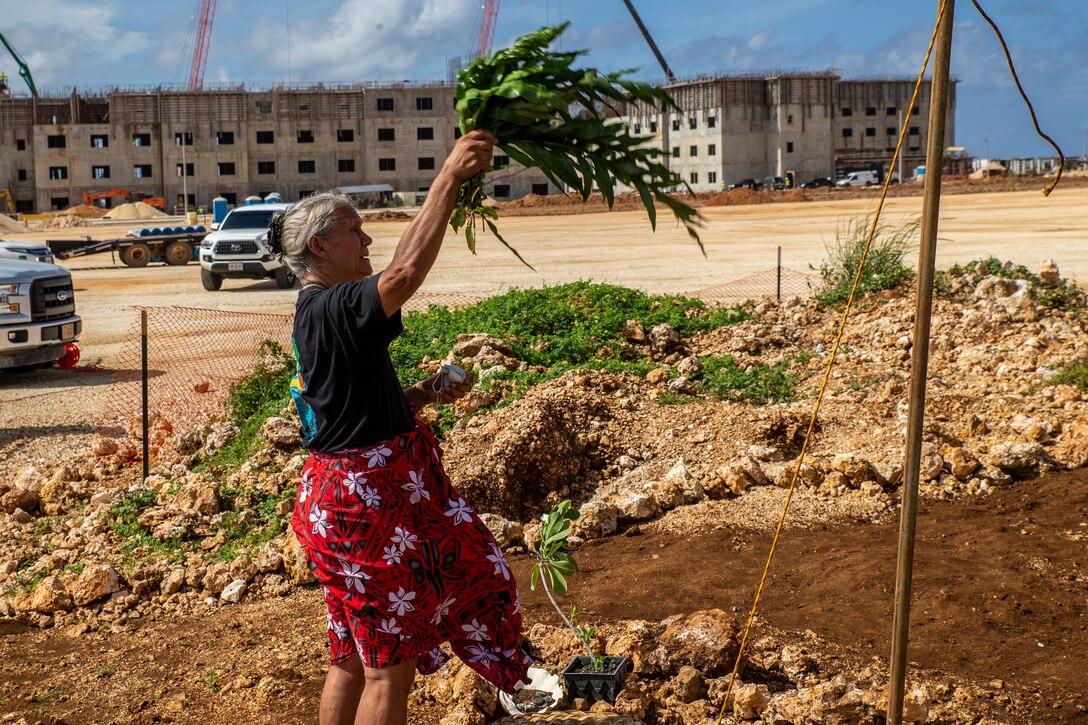 Toni ‘Malia’ Ramirez, Guam historian, performs a CHamoru dedication during a cultural ritual at the Sabånan Fadang burial site on Marine Corps Base Camp Blaz, Nov. 23, 2021. The burial site includes seven grave pits comprised of multiple individuals, with the final overall number of individuals still pending analysis. The ritual is the first of its kind as the ceremonies are typically held later, as required under Guam law, when monuments are erected for reburial ceremonies.