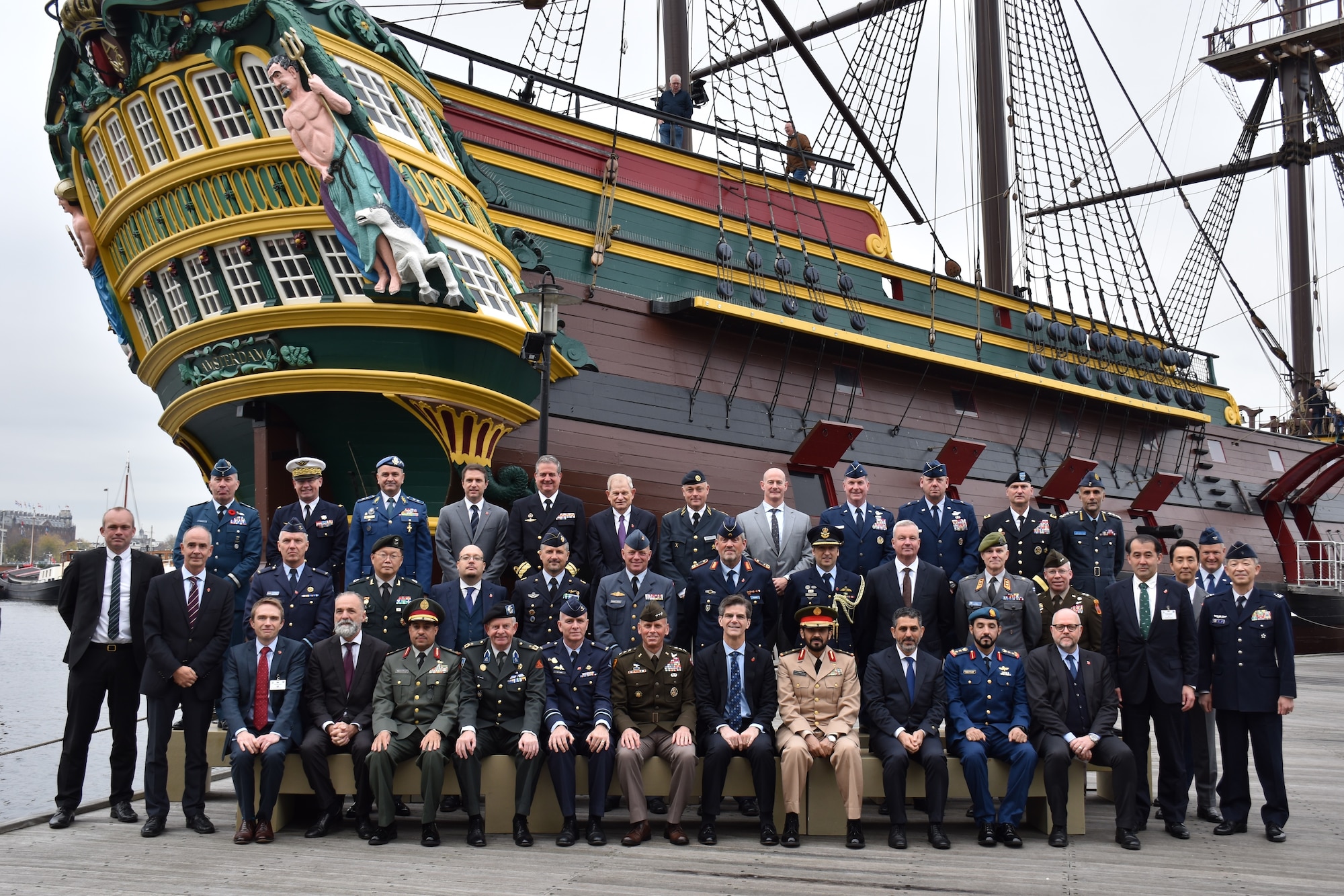 men in front of ship