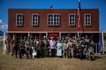 U.S. Marines with Marine Corps Base Hawaii, pose for a photo after the U.S. Marine Corps Birthday Pageant, MCBH, Nov. 10, 2021. The pageant celebrated the birthday of the Marine Corps and highlighted each era of the Corps’ history. (U.S. Marine Corps photo by Staff Sgt. Jordan Gilbert)