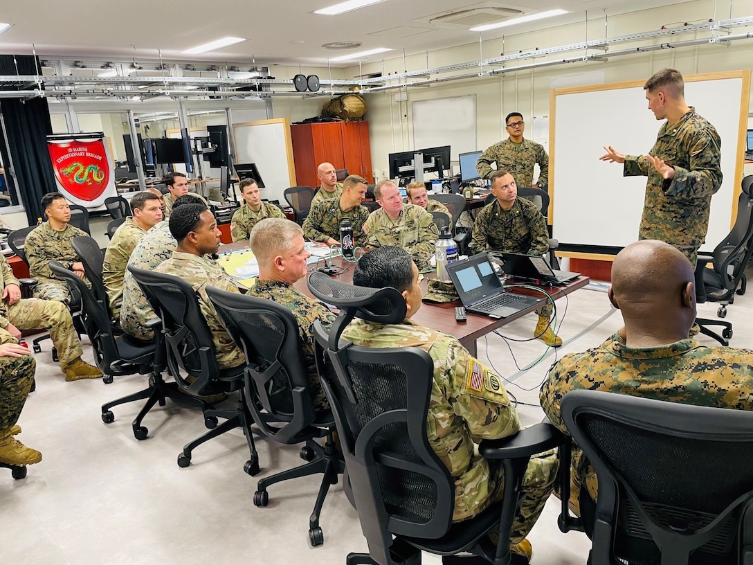 U.S. Marine Corps Maj. Alex Butta, Future Operations Planner, 3rd Marine Expeditionary Brigade, briefs members with Maneuver Advisor Team 5310, Force Package 22-1, 5th Security Force Assistance Brigade, as well as other MEB planning staff aboard Camp Courtney, in Okinawa, Japan, Nov. 19, 2021 in preparation for participation in Yama Sakura 81. Yama Sakura 81 is the largest U.S.-Japan bilateral and joint command post exercise which enables participants to work as dedicated partners in support of the Japan-U.S. security alliance and for continued peace and stability in the Indo-Pacific. This year’s exercise commemorates the 40th anniversary of Yama Sakura.