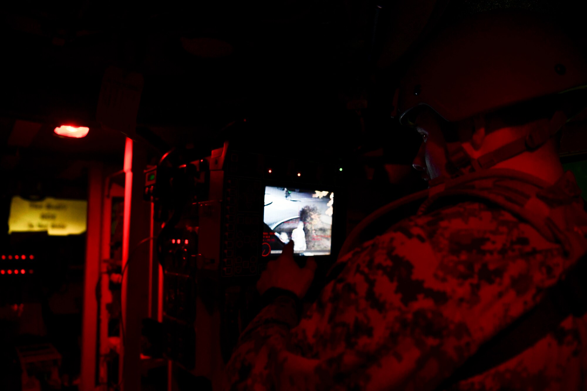 U.S. Marine Corps Sergeant David Sigdestad, explosive ordnance disposal technician, embedded with the 8th Civil Engineer Squadron, surveils danger zone during a simulated unexploded ordnance alert call routine training at Kunsan Air Base, Republic of Korea, Nov. 4, 2021. EOD specialists are trained to detect, disarm and dispose of explosive threats in the most extreme environments and serve as the U.S. Air Force’s bomb squad. (U.S. Air Force photo by Staff Sgt. Jesenia Landaverde)