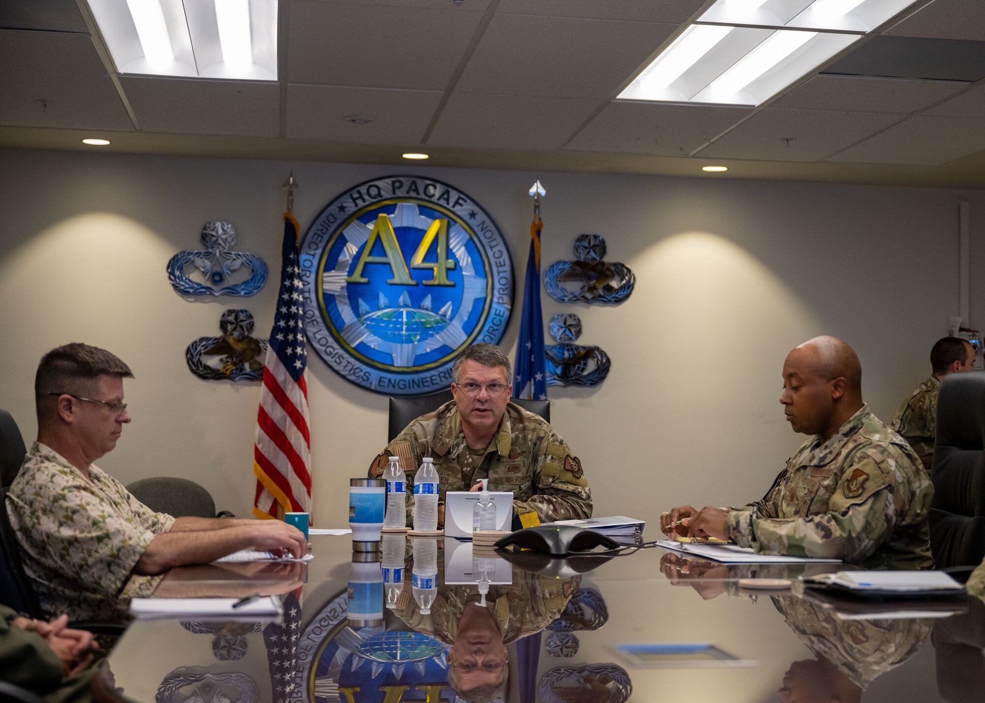 Photo of Airmen in a conference room