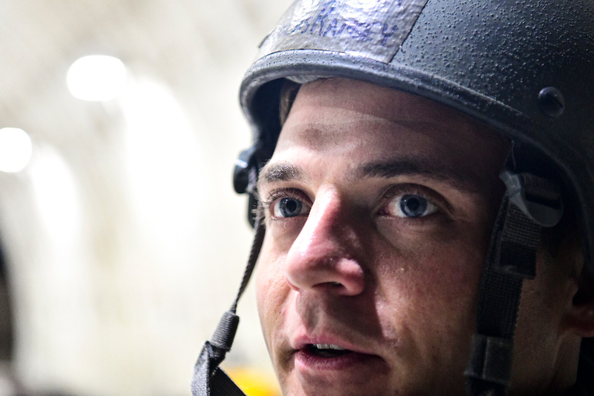 An Airman speaks to his crew members.