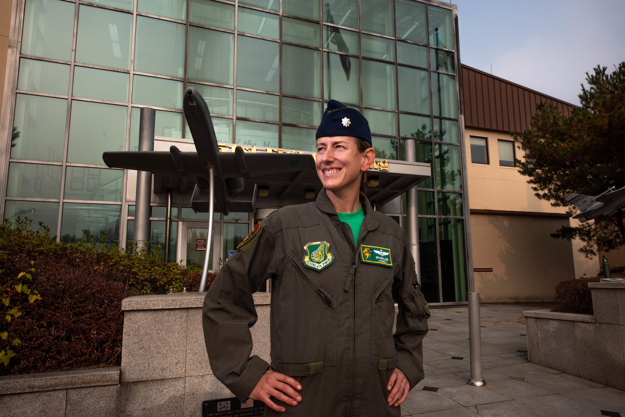 Lt. Col. Chandra Flemming poses for a picture outside of the 51st Fighter Wing headquarters building at Osan