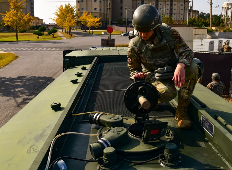 Airman 1st Class Henry Therese, 8th Logistic Readiness Squadron fuels flight fuels lab technician, monitors fuel levels at Kunsan Air Base, Republic of Korea, Nov. 4, 2021. The 8th CES electrical power production unit and 8th Logistics Readiness Squadron fuels flight test their ability to provide power to the base with BPUs, which run on fuel. (U.S. Air Force photo by Staff Sgt. Jesenia Landaverde)