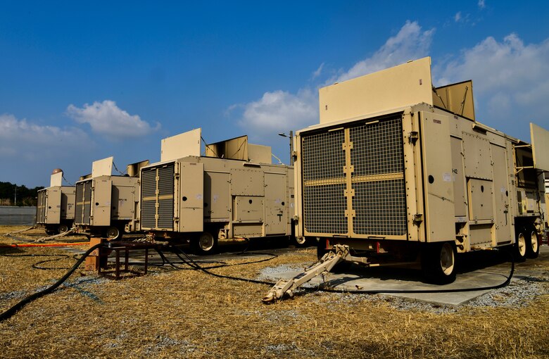 Four bare power unit (BPU) high voltage generators provide power to the installation at Kunsan Air Base, Republic of Korea, Nov. 4, 2021. The 8th Civil Engineer Squadron electrical power production unit and 8th Logistics Readiness Squadron fuels flight test their ability to provide power to the base with BPUs, which run on fuel. (U.S. Air Force photo by Staff Sgt. Jesenia Landaverde)