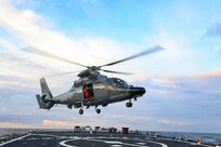 The Arleigh Burke-class guided-missile destroyer USS Porter (DDG 78) conducts flight operations with the French Navy during Exercise Polaris on Patrol 10, Nov. 23, 2021.