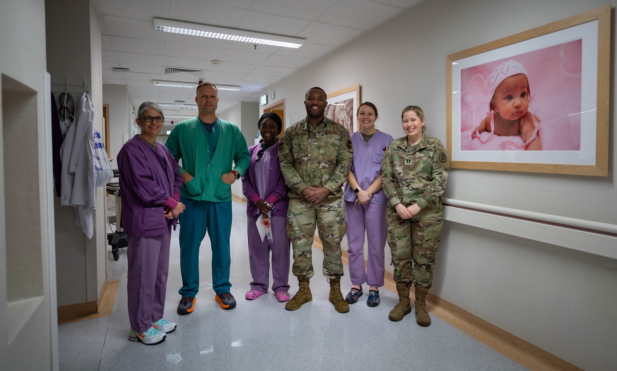 Members of the Division of Women’s Health and Newborn Care Labor and Delivery team, are responsible for caring for antepartum, intrapartum and postpartum patients at Landstuhl Regional Medical Center, Nov. 9, 2021. U.S. Air Force Staff Sgt. Lamaar Melvin, third from right, 86th Medical Squadron Labor and Delivery supervisor, is responsible for running the Labor and Delivery floor, where he aids in the health and wellness of newborns. (U.S. Air Force photo by Airman Jared Lovett)