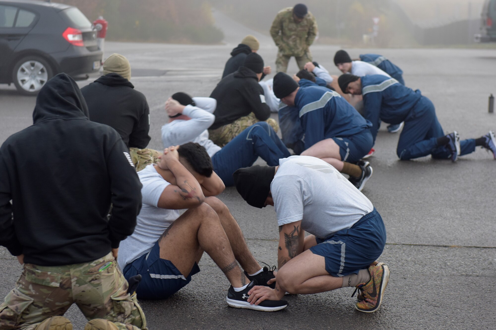 Airmen do sit-ups