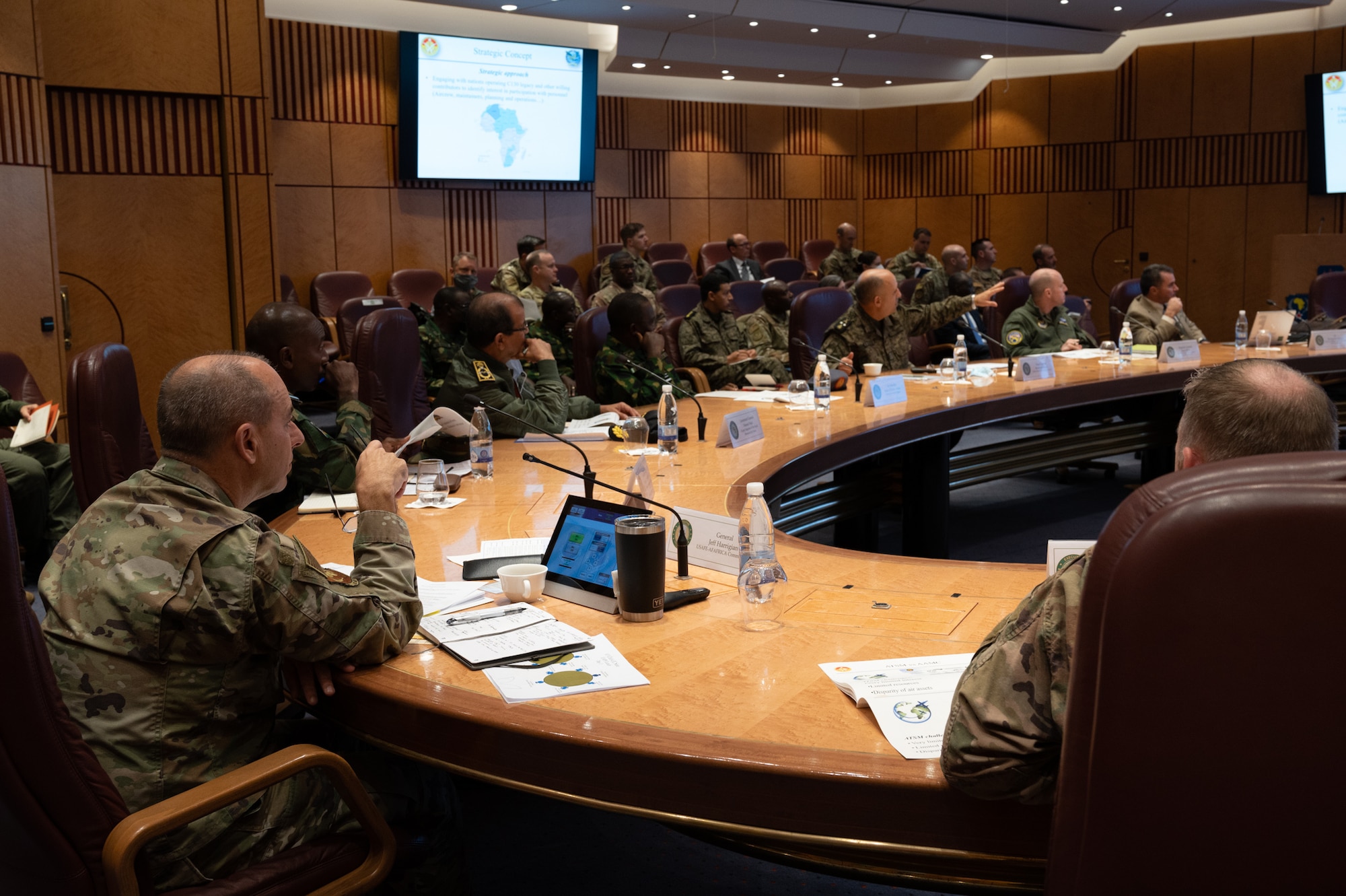 U.S. Air Forces in Europe and Air Forces Africa Commander Gen. Jeff Harrigian and Tunisian Air Force Chief of Staff Maj. Gen. Mohamed Hajem discuss potential opportunities for combined operations during an Executive African Partnership Flight strategic planning event at Ramstein Air Base, Germany, Nov. 8, 2021.