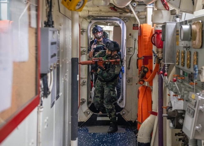 211105-N-UT641-0004 MEDITERRANEAN SEA (Nov. 05, 2021) Sailors assigned to the Tunisian Naval offshore patrol vessel TNS Jugurtha (P610) practice proper boarding procedures aboard the Arleigh Burke-class guided-missile destroyer USS The Sullivans (DDG 68) during a visit, board, search and seizure (VBSS) training exercise, Nov. 05, 2021. The Sullivans, homeported in Mayport, Fl, is on a scheduled deployment in the U.S. Sixth Fleet area of operations in support of U.S. national security interests in Europe and Africa. (U.S. Navy photo by Mass Communication Specialist 3rd Class Janiel Adames)