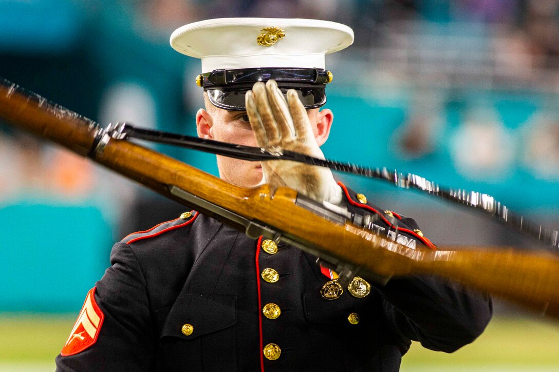 A Marine performs a silent drill.