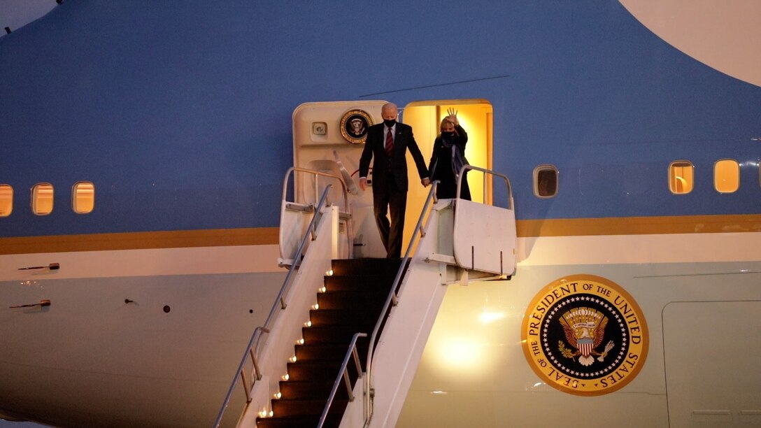 President Joe Biden and First Lady Dr. Jill Biden get off a plane.