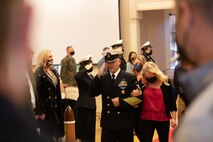 U.S. Navy Command Master Chief Richard Jackson, is saluted by all officers at the conclusion of his retirement ceremony on Camp Lejeune, North Carolina, Nov. 23, 2021. During the ceremony Jackson officially retired from the position of Command Master Chief of 2nd Marine Logistics Group. (U.S. Marine Corps photo by Lance Cpl. Meshaq Hylton)