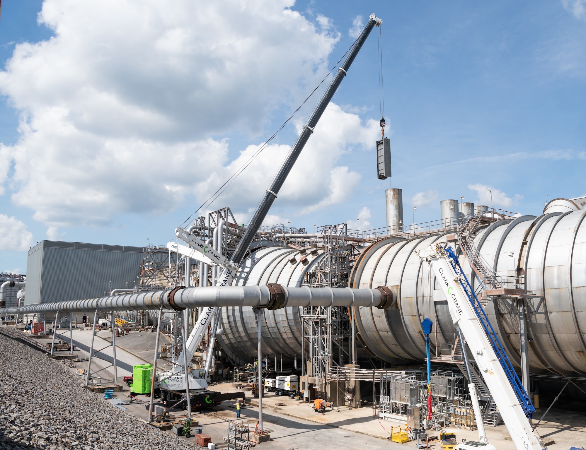 A heat exchanger is lifted and lowered into exhaust cooler 1 of the Aeropropulsion Systems Test Facility at Arnold Air Force Base, Tenn., Sept. 29, 2021. (U.S. Air Force photo by Jill Pickett)