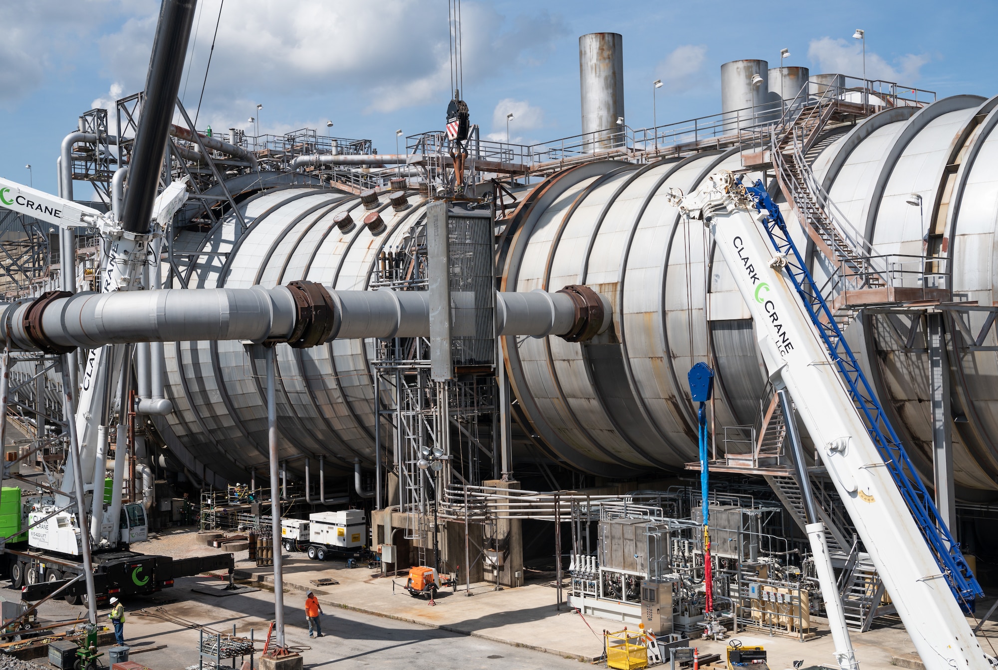 A heat exchanger is lifted and lowered into exhaust cooler 1 of the Aeropropulsion Systems Test Facility at Arnold Air Force Base, Tenn., Sept. 29, 2021. (U.S. Air Force photo by Jill Pickett)