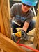 Capt. Holly Beard assists in the building of a new home as part of Honolulu Habitat for Humanity's Veterans Build 2021 which will provide a new home for a Native Hawaiian family and U.S. Navy Veteran