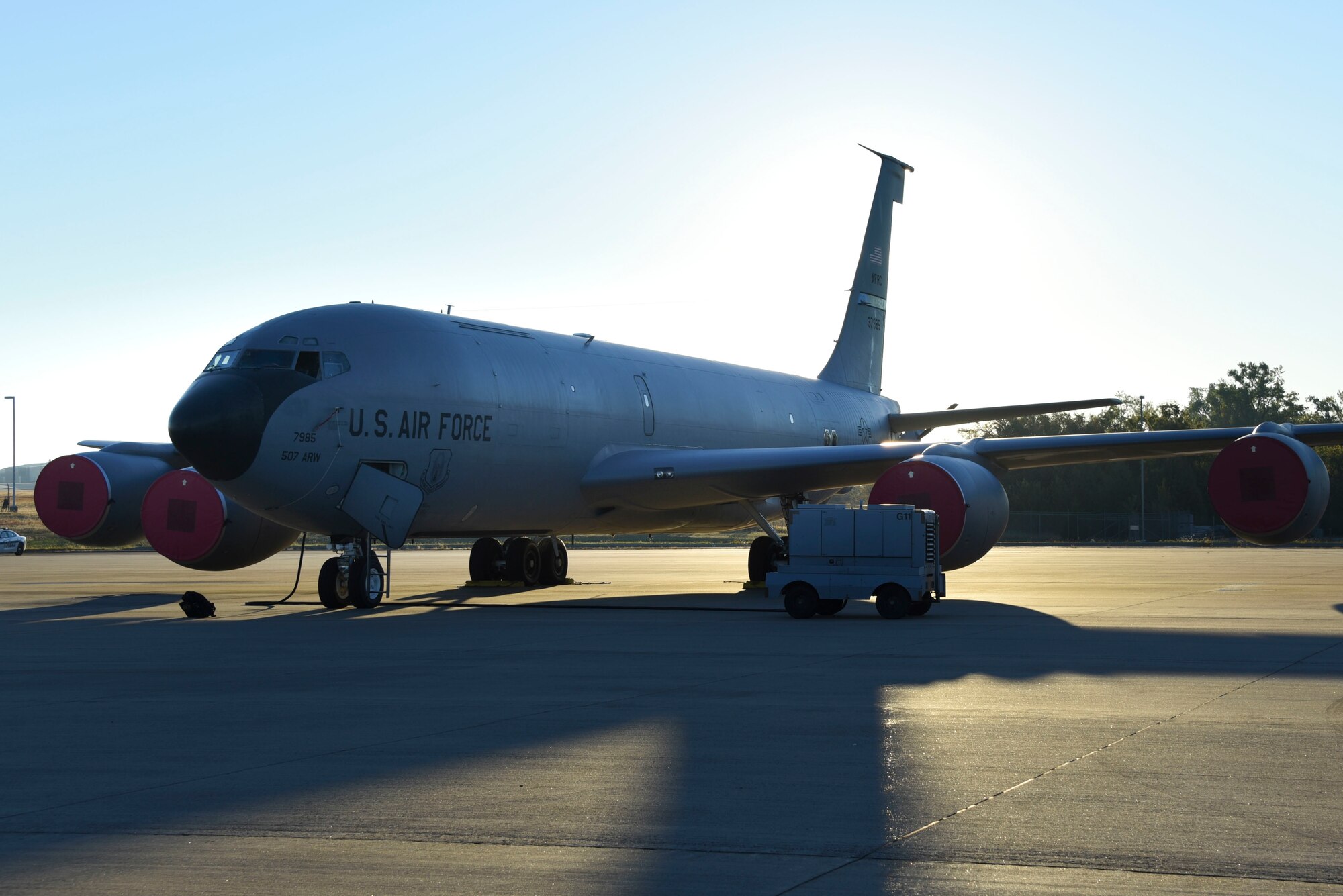 A KC-135 Stratotanker sits on the ramp being inspected during the Global Thunder exercise, Nov. 7, 2021, on Tinker Air Force Base, Oklahoma. Global Thunder is a is a U.S. Strategic Command annual nuclear command and control and field training exercise. (U.S. Air Force photo by Staff Sgt. Jasmine Czajka)