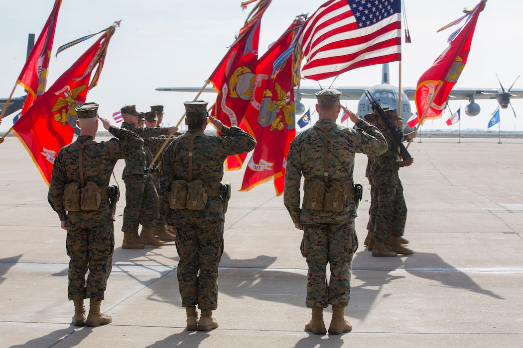 U.S. Marines with 3rd Marine Aircraft Wing (MAW), pass in review during the 3rd MAW relief and appointment ceremony on Marine Corps Air Station Miramar, California, Nov. 18, 2021. The ceremony was held to transfer responsibilities from Sgt. Maj. David A. Wilson to Sgt. Maj. Rosalia Scifo. (U.S. Marine Corps photo by Lance Cpl. Alondra Ortiz-Montejano)