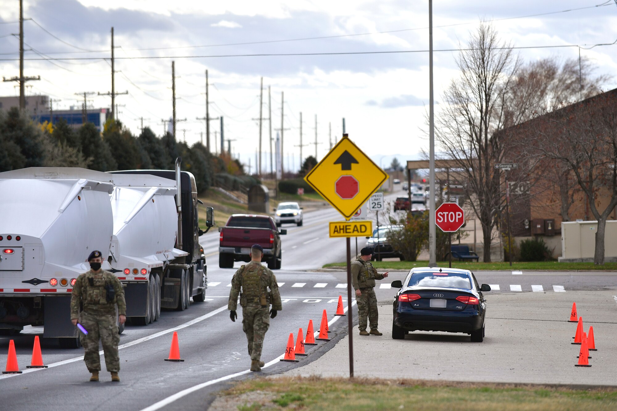 A vehicle is pulled over during a base-wide speed limit enforcement evolution.