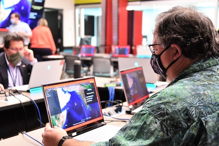 IMAGE: – Dr. George Foster, the Navy’s Distinguished Engineer for Combat Control, plays Simulated Practice Integrating New Technologies (SPRINT) during a wargaming event at Naval Surface Warfare Center Dahlgren Division. SPRINT is a game which allows users to defend a designated ship using an array of weapons systems.