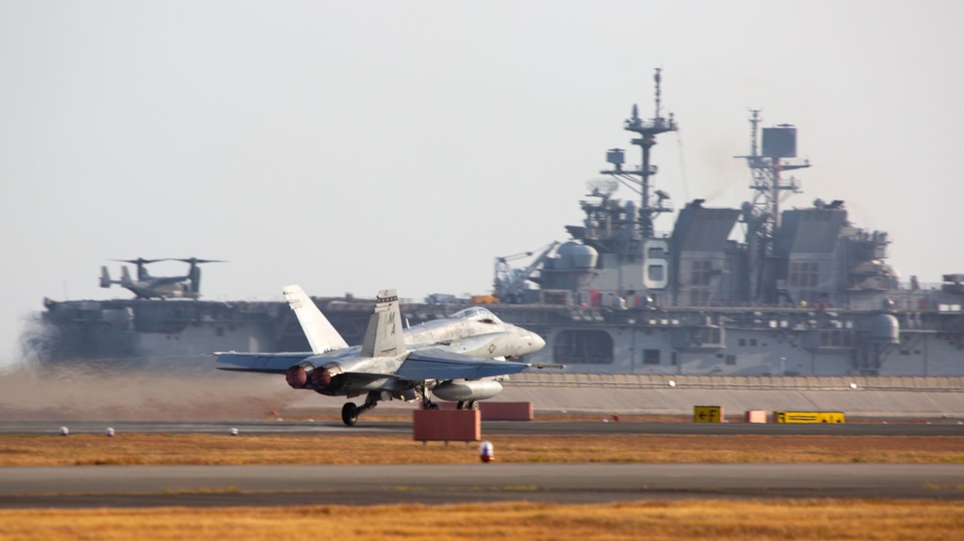 A U.S. Marine Corps F/A-18C Hornet aircraft with Marine Fighter Attack Squadron 112 takes off from Marine Corps Air Station (MCAS) Iwakuni, Japan, Nov. 18, 2021. VMFA-112 participated in a joint maritime strike rehearsal with the U.S. Navy off the coast of Okinawa, Nov 19, 2021. U.S. Marines with VMFA-112 routinely train and rehearse joint maritime mission sets in order to maintain readiness to carry out a wide range of operational tasks in a region characterized by vast oceans, seas, and waterways.