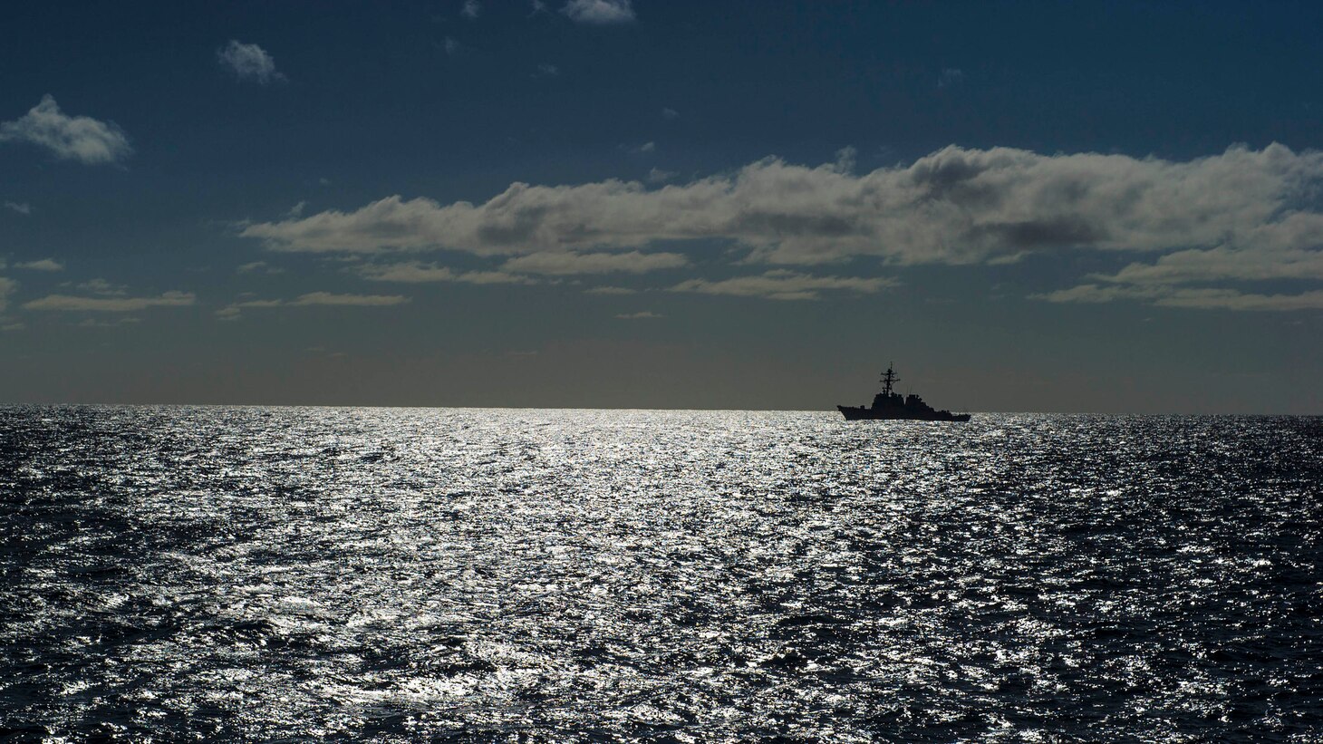 The guided missile destroyer USS Arleigh Burke (DDG 51) transits the Atlantic Ocean.