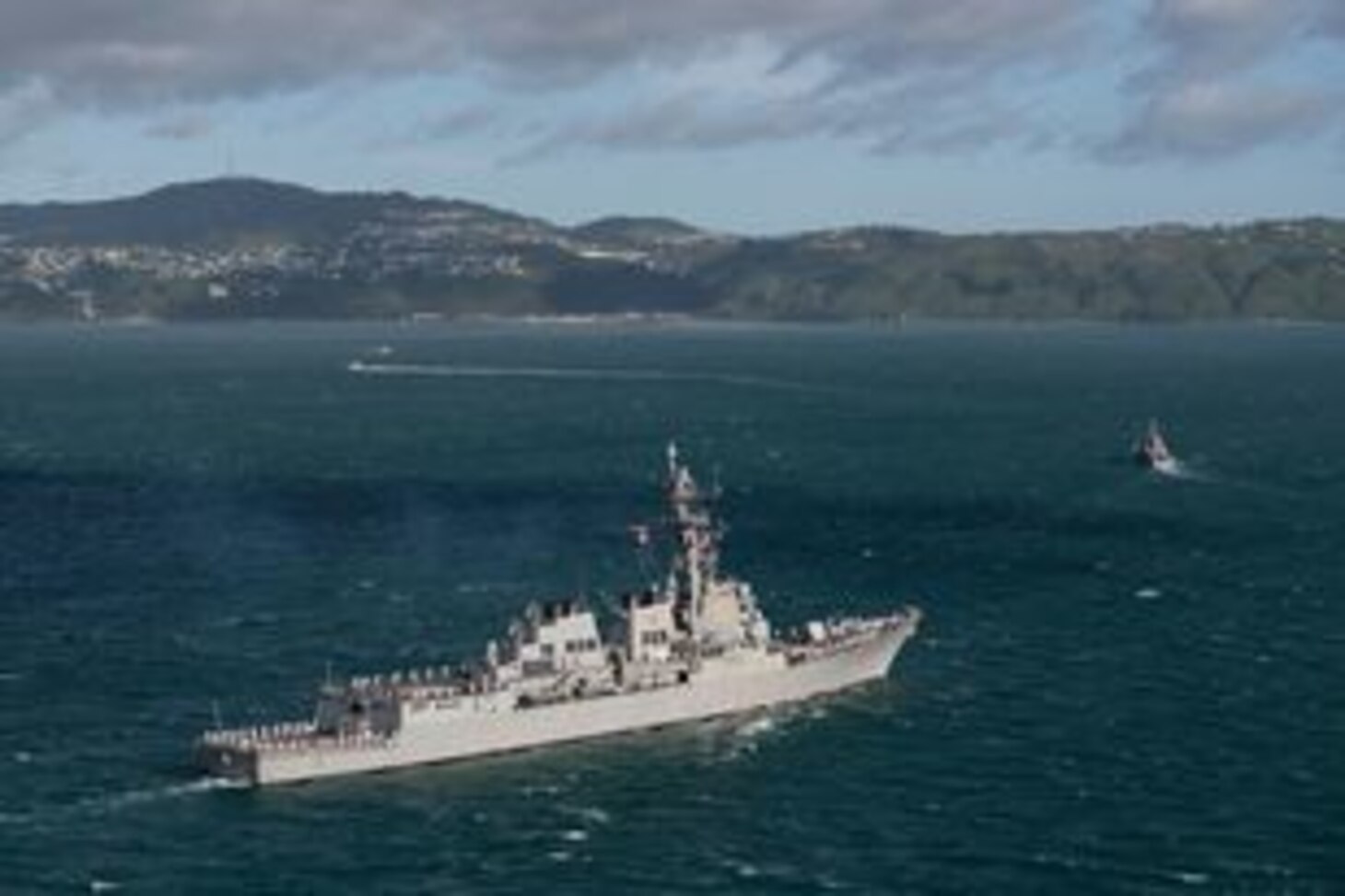 WELLINGTON, New Zealand (Nov. 25, 2021) USS Howard (DDG 83) arrives in New Zealand for a routine port visit, marking the first visit to the country from a U.S. warship since 2016. Howard is assigned to Commander, Task Force (CTF) 71/Destroyer Squadron (DESRON) 15, the Navy's largest forward-deployed DESRON and the U.S. 7th Fleet's principal surface force. (Courtesy photo by New Zealand Defense Force)