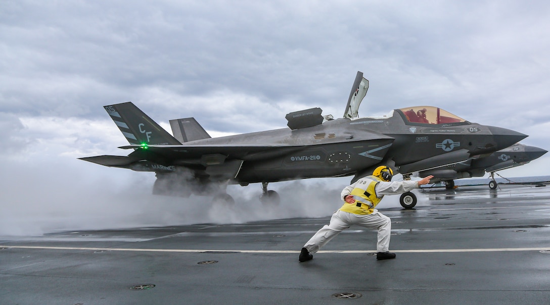 A U.S. Marine with Marine Fighter Attack Squadron 211 accelerates an F-35B Lightning II on the flight deck of the Royal Navy aircraft carrier HMS Queen Elizabeth in the Mediterranean Sea on Nov. 24, 2021. VMFA-211 aircraft landed at Naval Station Rota as the first stop on their redeployment to Marine Corps Air Station Yuma, Ariz. The success of this deployment demonstrates that the United States and the United Kingdom are united in our efforts to ensure security and freedom of the seas, that our maritime power projection capabilities are interoperable, complementary, and global.