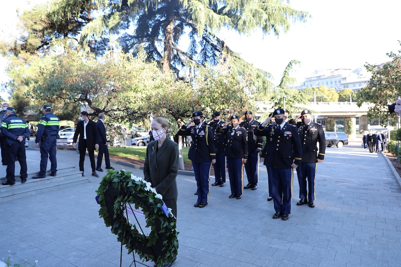 Ambassador Degnan and Soldiers from U.S. Army Medical Directorate-Georgia take part in a wreath laying ceremony.