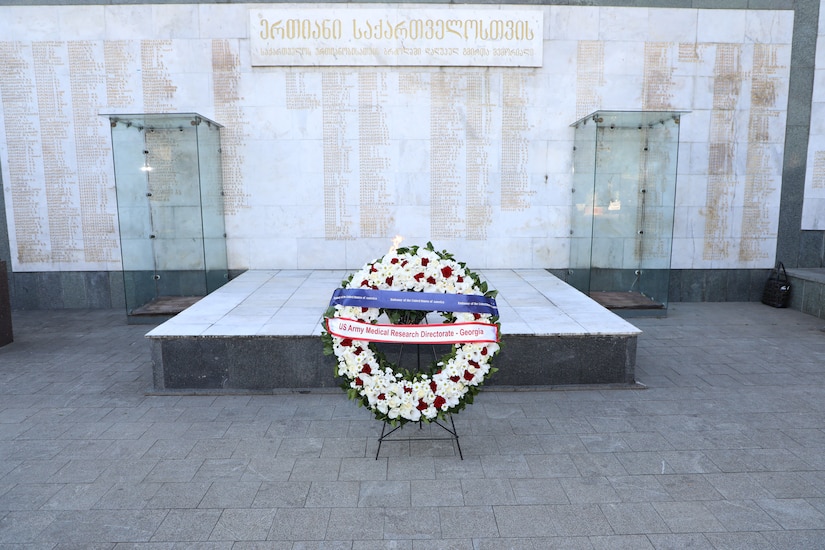 Ambassador Degnan and Soldiers from U.S. Army Medical Directorate-Georgia take part in a wreath laying ceremony.