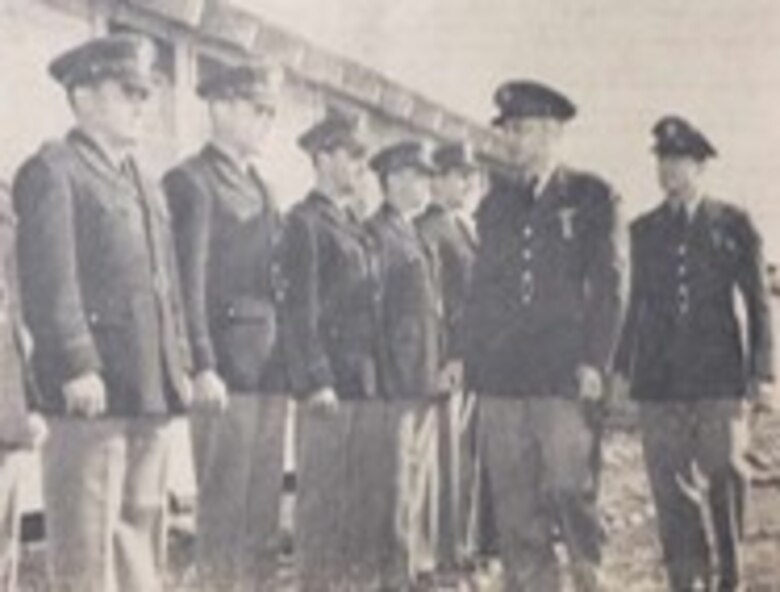 Sixty-eight new officers have arrived at Portland Air Base in the fall of 1941. Here are a few of them shown during their first inspection. Reviewing officers include Major James W. McCauley, Commander of the 55th Pursuit Group, left, and Lieutenant Jack S. Jenkins. (Photo courtesy of the Oregonian, 142nd Wing History Archive)
