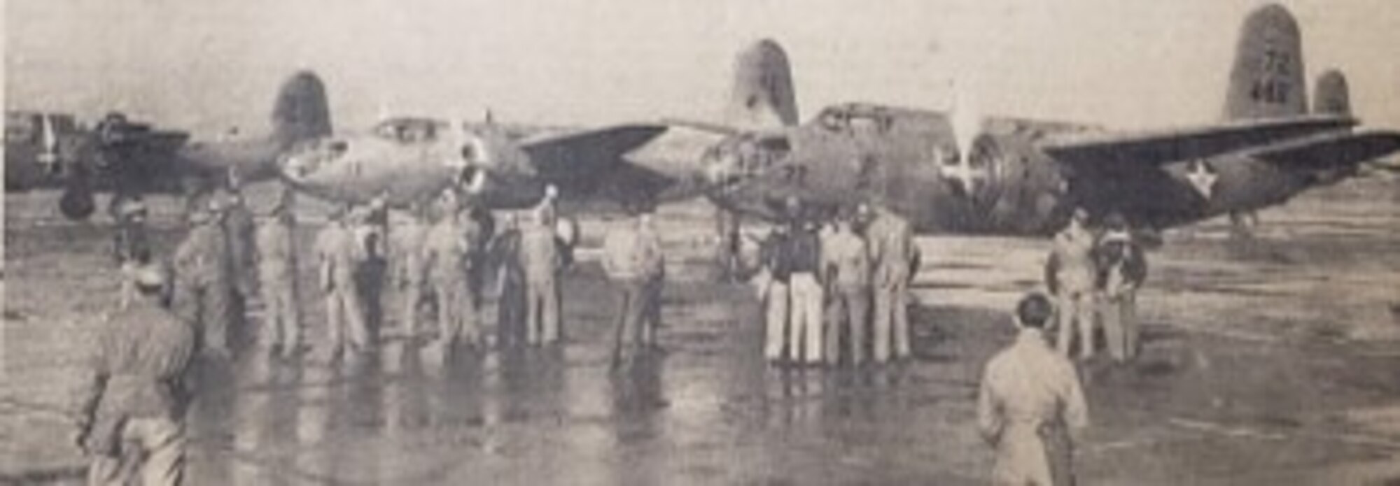 Douglas A-20A Havoc light bombers from visiting squadrons of the 48th Bombardment Group (Light) out of Will Rogers Field, Oklahoma, occupy the ramp at Portland Air Base in order to participate in the big air defense maneuver of late October, 1941. They wear the 48th Bomb Group’s 48B designation on the tail as Number 72 (nearest) runs up its engines while onlookers of the then-new aircraft watch with interest. (142nd Wing History Archive)