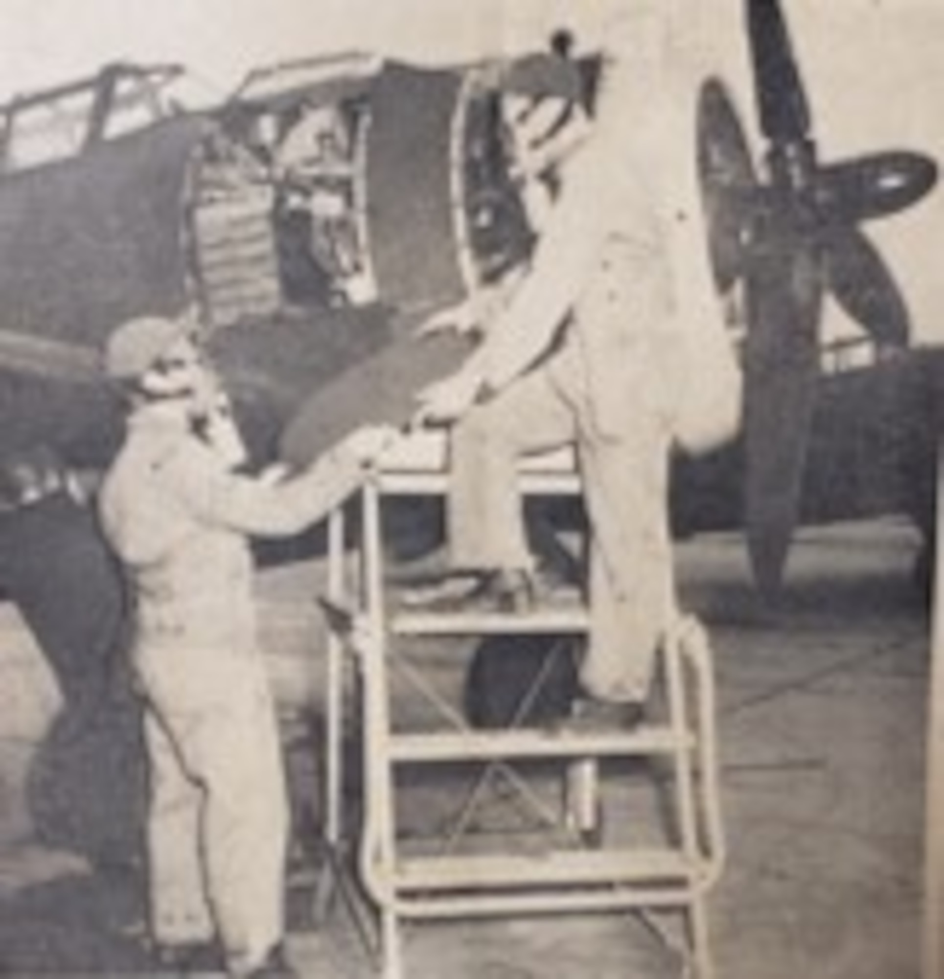 When the “enemy” gas alarm sounded at Portland Air Base on October 27, 1941, soldiers grabbed their gas masks and went on with their regular duties. It was the first base defense exercise held at PAB. Above are Privates J. J. Frisby, left, and E. Saathhoff make repairs on a Republic P-43 Lancer fighter plane on the flightline during the simulated attack. (Courtesy of the Oregonian, 142nd Wing History Archive)