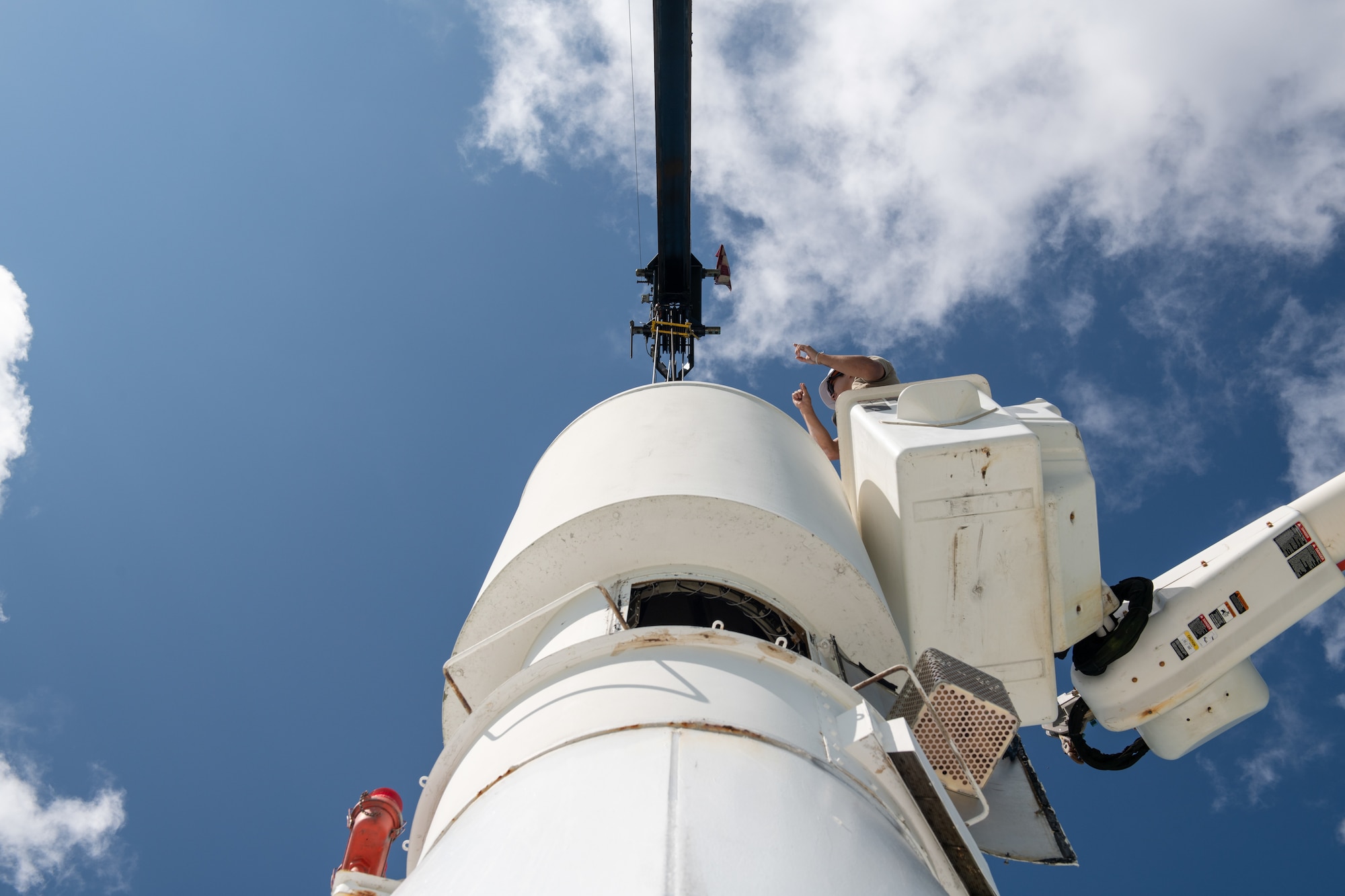 A cloud passes over a newly installed antenna