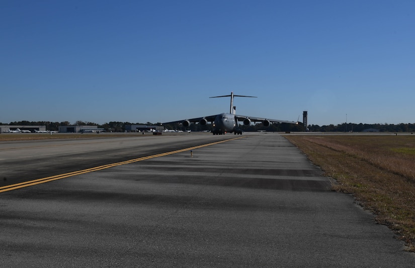 A ceremony is held to celebrate 25,000 flying hours of the C-17 Globemaster III, tail number 0534, at Joint Base Charleston, S.C., Nov. 16, 2021.