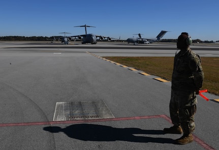 A ceremony is held to celebrate 25,000 flying hours of the C-17 Globemaster III, tail number 0534, at Joint Base Charleston, S.C., Nov. 16, 2021.