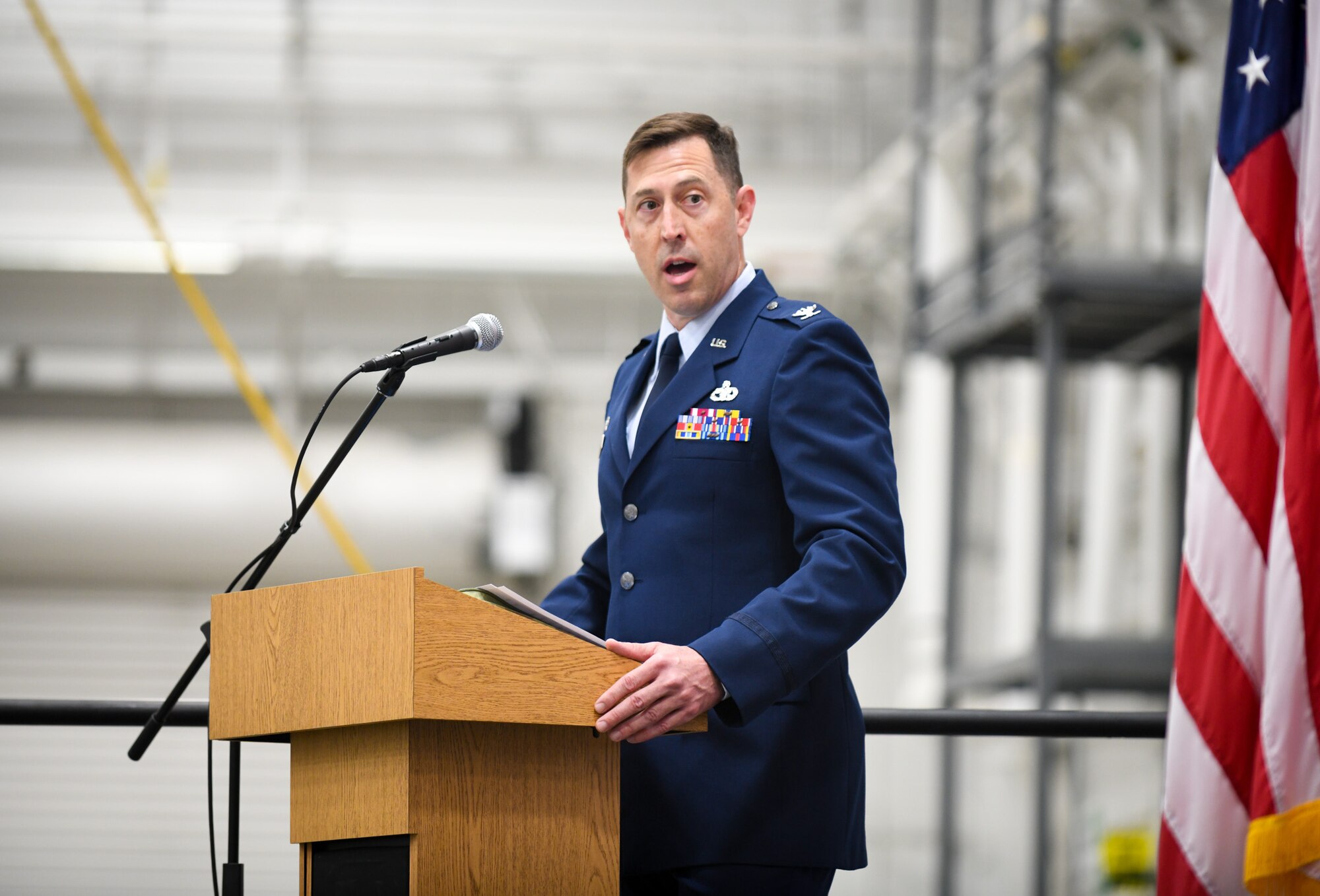 Col. Greg Meyer, commander of the 910th Mission Support Group, introduces Maj. Robert Lytle as the incoming commander of the 76th Aerial Port Squadron during an assumption of command ceremony, Nov. 6, 2021, at Youngstown Air Reserve Station, Ohio.