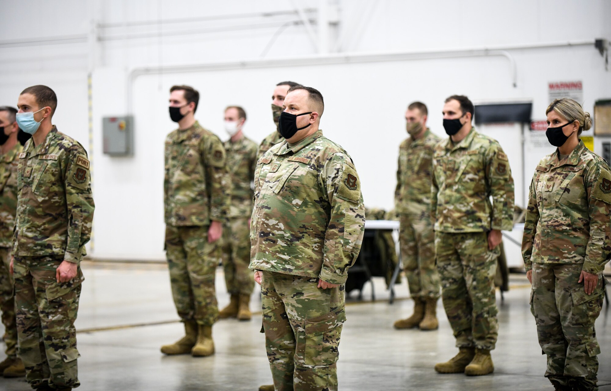 Members of the 76th Aerial Port Squadron stand at attention during Maj. Robert Lytle’s assumption of command ceremony, Nov. 6, 2021, at Youngstown Air Reserve Station, Ohio.