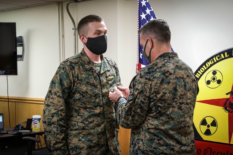 Indian Head, Md. (November 24, 2021) – U.S. Marines and Sailors from Chemical Biological Incident Response Force (CBIRF) receive awards for work above and beyond the call of duty in both the preparation and execution of a Commanding General’s Readiness Inspection (CGRI), aboard Naval Support Facility Indian Head, Md. on November 24, 2021. CGRI are extremely important to both the unit and the Commanding General, as it is a tool to allow the Commanding General to see exactly how effective and mission capable a unit is. Because of these Marines tireless efforts, CBIRF is mission capable, and continues our expeditious mindset of fighting the unseen enemy. (Official U.S. Marine Corps photo by Gunnery Sgt. Kristian S. Karsten/Released)