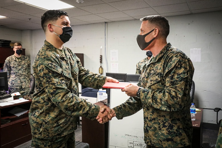 Indian Head, Md. (November 24, 2021) – U.S. Marines and Sailors from Chemical Biological Incident Response Force (CBIRF) receive awards for work above and beyond the call of duty in both the preparation and execution of a Commanding General’s Readiness Inspection (CGRI), aboard Naval Support Facility Indian Head, Md. on November 24, 2021. CGRI are extremely important to both the unit and the Commanding General, as it is a tool to allow the Commanding General to see exactly how effective and mission capable a unit is. Because of these Marines tireless efforts, CBIRF is mission capable, and continues our expeditious mindset of fighting the unseen enemy. (Official U.S. Marine Corps photo by Gunnery Sgt. Kristian S. Karsten/Released)