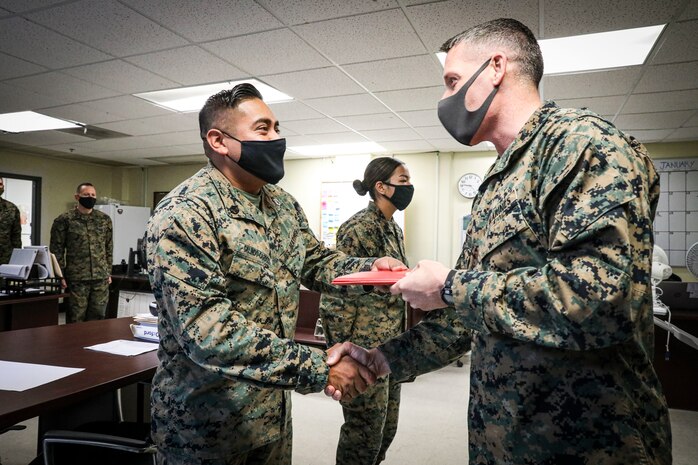 Indian Head, Md. (November 24, 2021) – U.S. Marines and Sailors from Chemical Biological Incident Response Force (CBIRF) receive awards for work above and beyond the call of duty in both the preparation and execution of a Commanding General’s Readiness Inspection (CGRI), aboard Naval Support Facility Indian Head, Md. on November 24, 2021. CGRI are extremely important to both the unit and the Commanding General, as it is a tool to allow the Commanding General to see exactly how effective and mission capable a unit is. Because of these Marines tireless efforts, CBIRF is mission capable, and continues our expeditious mindset of fighting the unseen enemy. (Official U.S. Marine Corps photo by Gunnery Sgt. Kristian S. Karsten/Released)