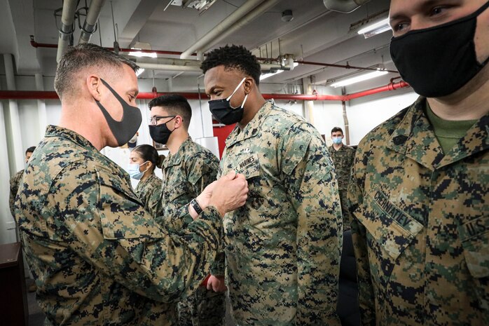 Indian Head, Md. (November 24, 2021) – U.S. Marines and Sailors from Chemical Biological Incident Response Force (CBIRF) receive awards for work above and beyond the call of duty in both the preparation and execution of a Commanding General’s Readiness Inspection (CGRI), aboard Naval Support Facility Indian Head, Md. on November 24, 2021. CGRI are extremely important to both the unit and the Commanding General, as it is a tool to allow the Commanding General to see exactly how effective and mission capable a unit is. Because of these Marines tireless efforts, CBIRF is mission capable, and continues our expeditious mindset of fighting the unseen enemy. (Official U.S. Marine Corps photo by Gunnery Sgt. Kristian S. Karsten/Released)