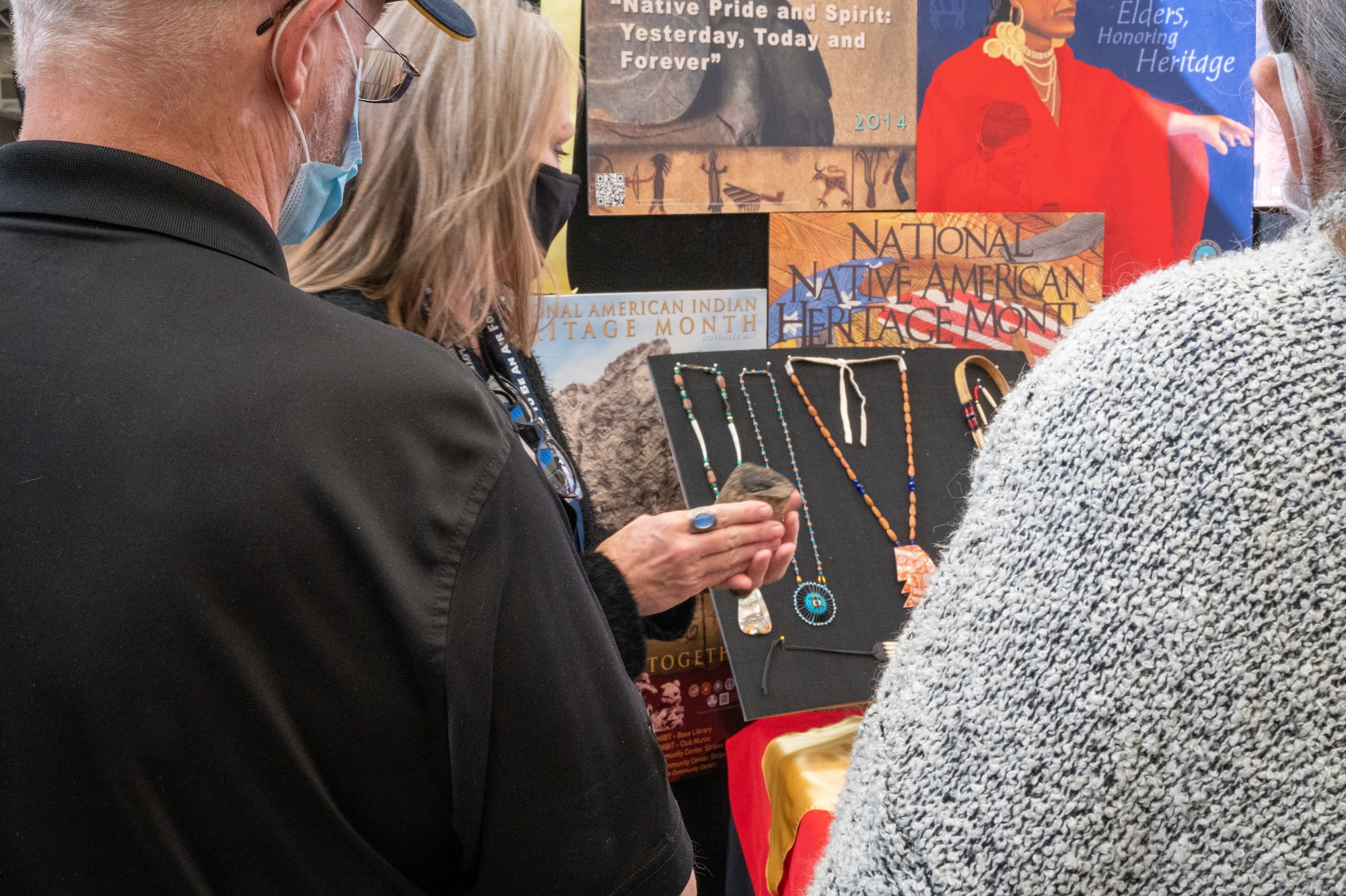 Edwards Air Force Base personnel view Native American artifacts from the Antelope Valley area during a National American Indian Heritage Month observance at the Base Exchange. (Air Force photo by Katherine Franco)