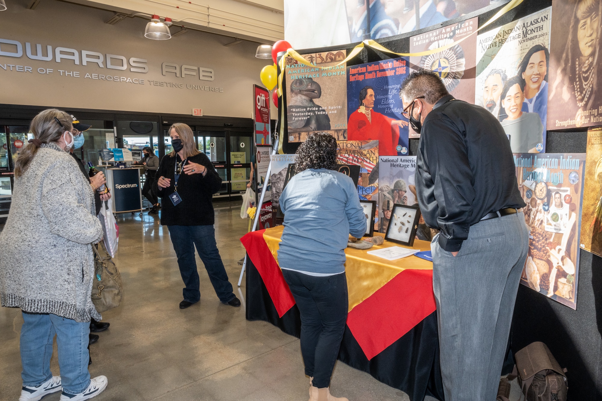 Edwards Air Force Base personnel view Native American artifacts from the Antelope Valley area during a National American Indian Heritage Month observance at the Base Exchange. (Air Force photo by Katherine Franco)