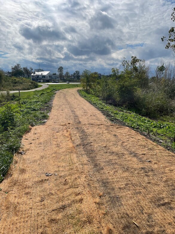 Seed cover on top of an earthen berm