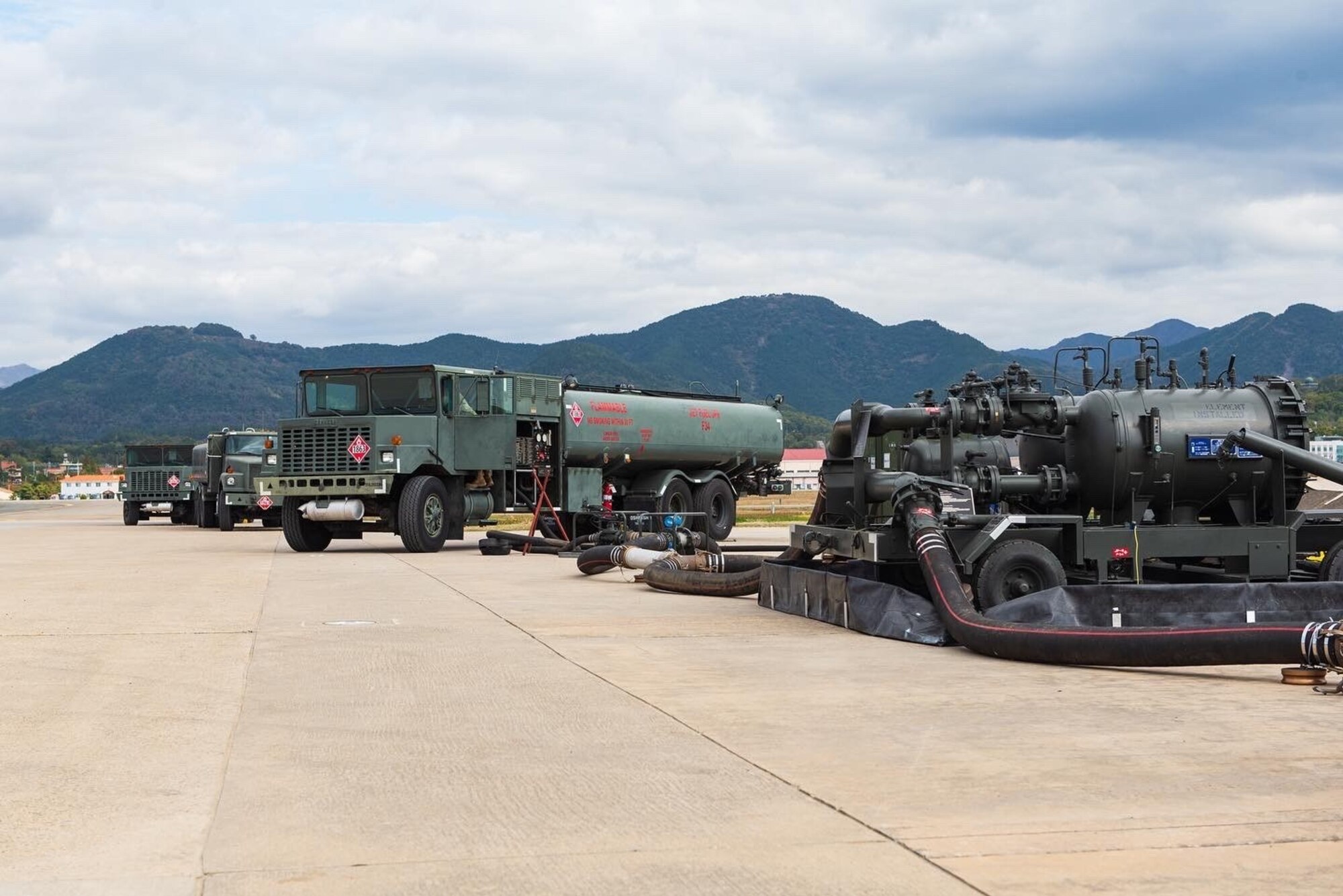 Fuels Operational Readiness Contingency Equipment (FORCE) components are lined up at Daegu Air Base, Republic of Korea, November 1, 2021. Petroleum, Oil and Lubricants personnel are responsible for monitoring the FORCE system while it waits to be filled. (U.S. Air Force photo by Senior Master Sgt. Michael Coad)