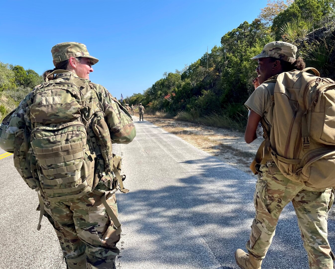 Col Storm marches alongside Airmen at ruck