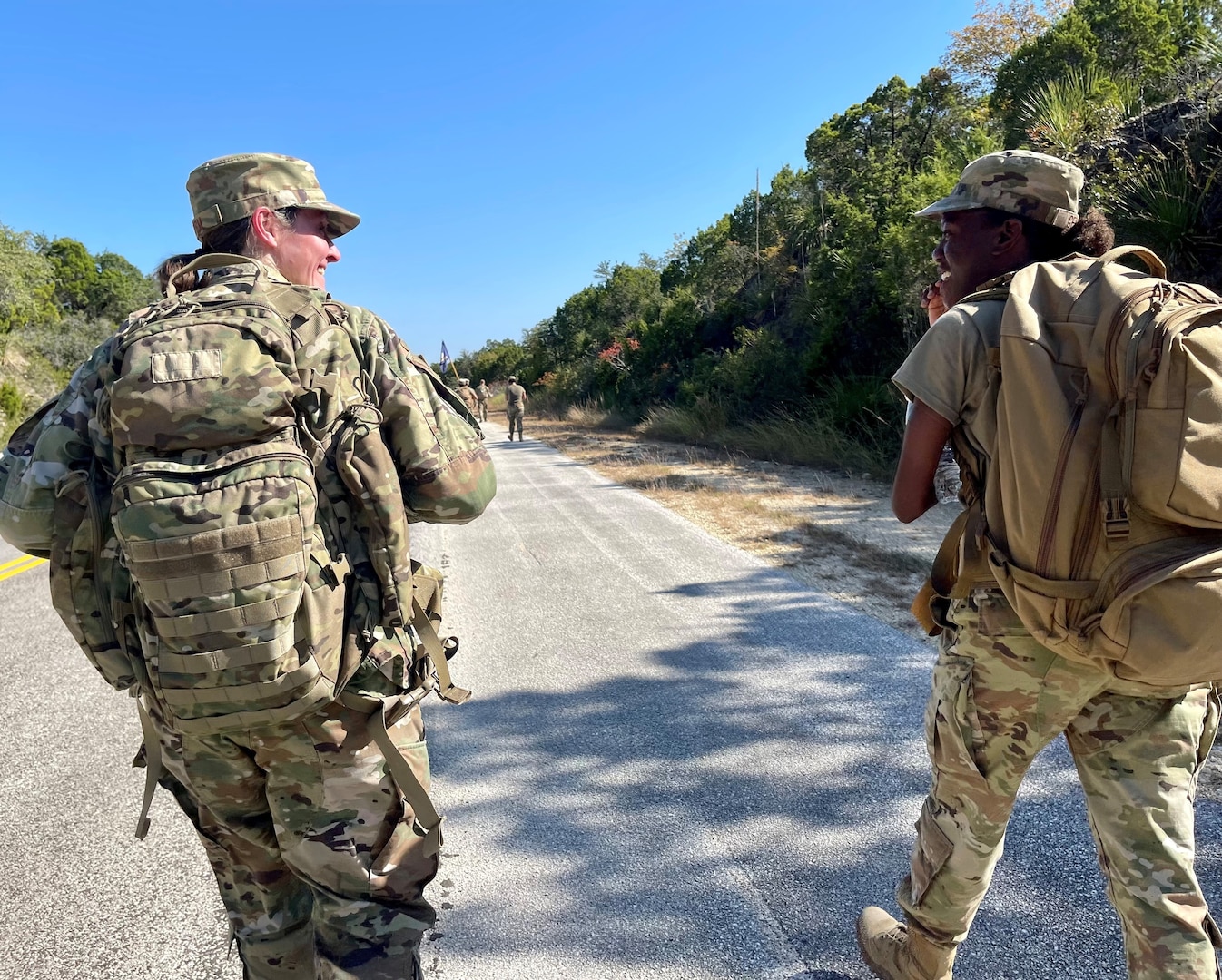 Col Storm marches alongside Airmen at ruck