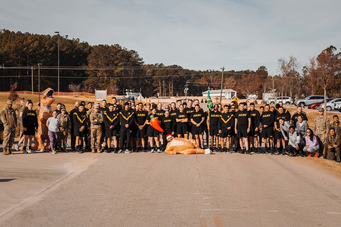 Task Force Pickett personnel pose for a photo before participating in a Turkey Trot 5K on Fort Pickett, Virginia, Nov. 25, 2021.